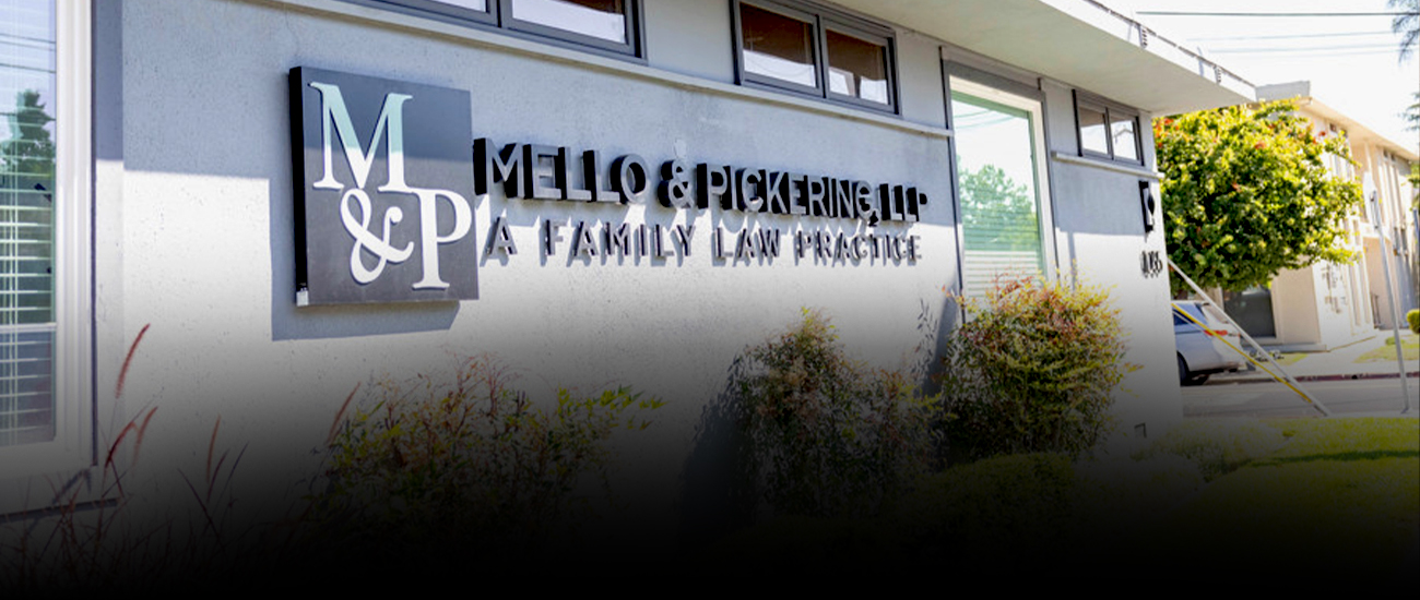 Signage of Mello & Pickering, LLP, A Family Law Practice, on building exterior.